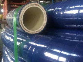 A roll of chemical plant hose with blue cover.